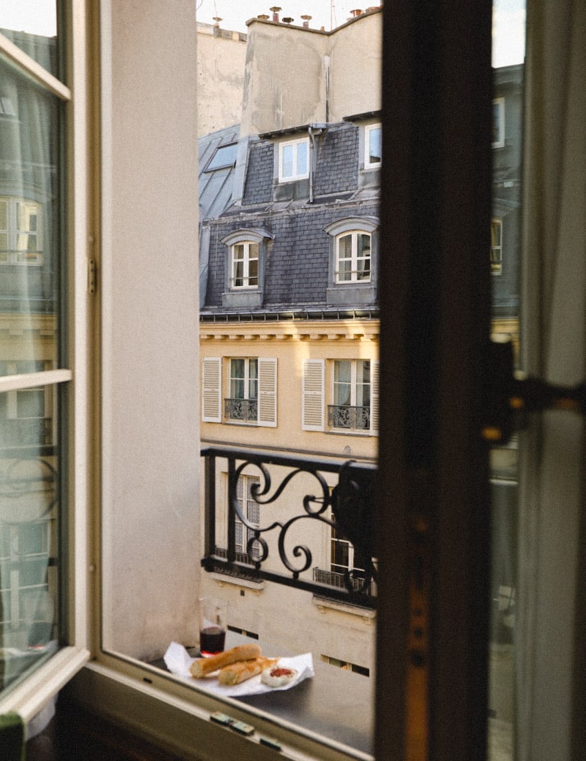 Hotel view in Paris with cheese and wine